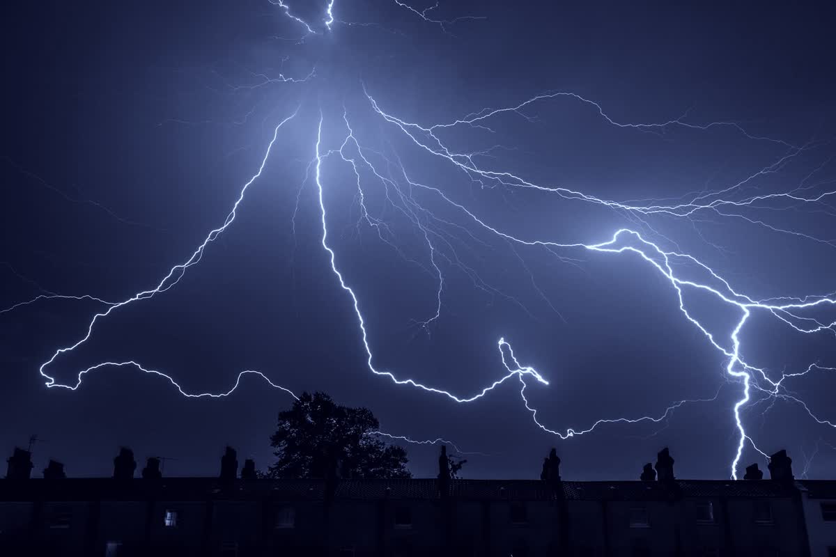 Lightning over a dark skyline